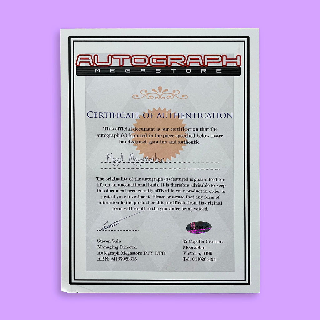 Certificate of Authentication from Autograph Megastore on a purple background