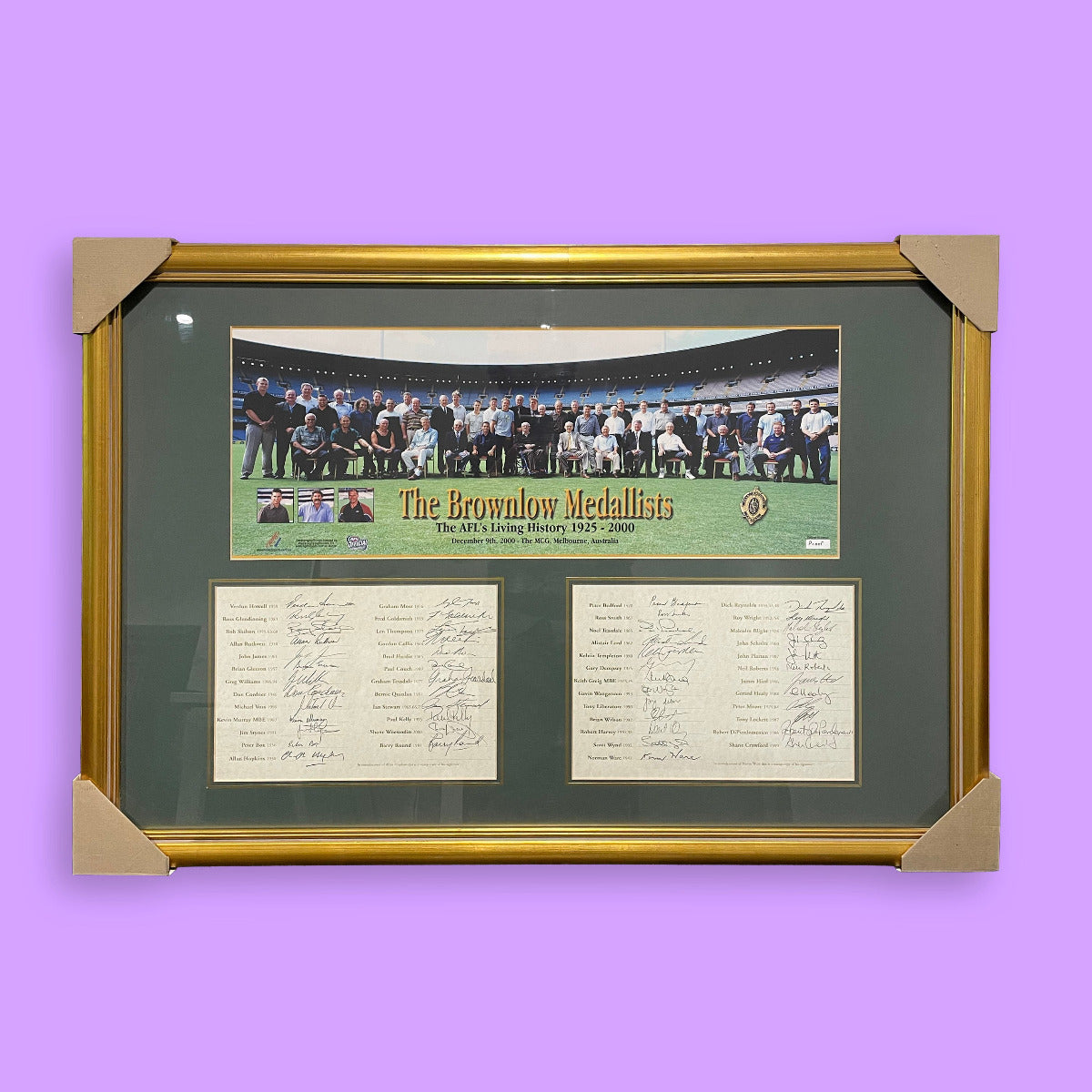 Framed sports memorabilia with a purple background