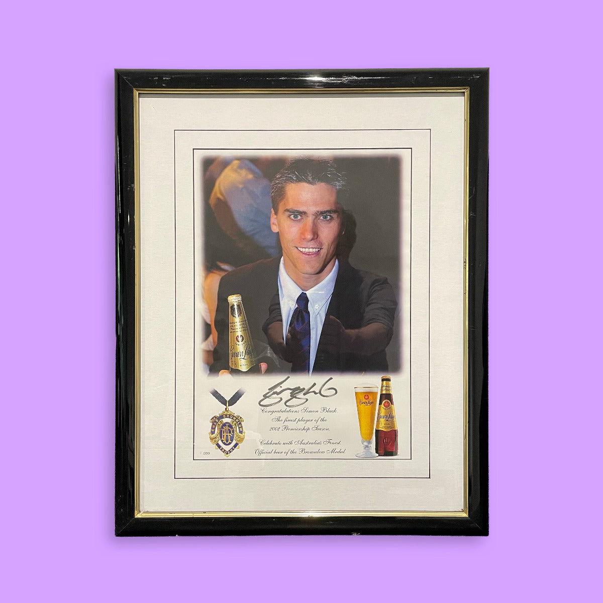 Framed picture Simon Black with a bottle and glasses on a purple background
