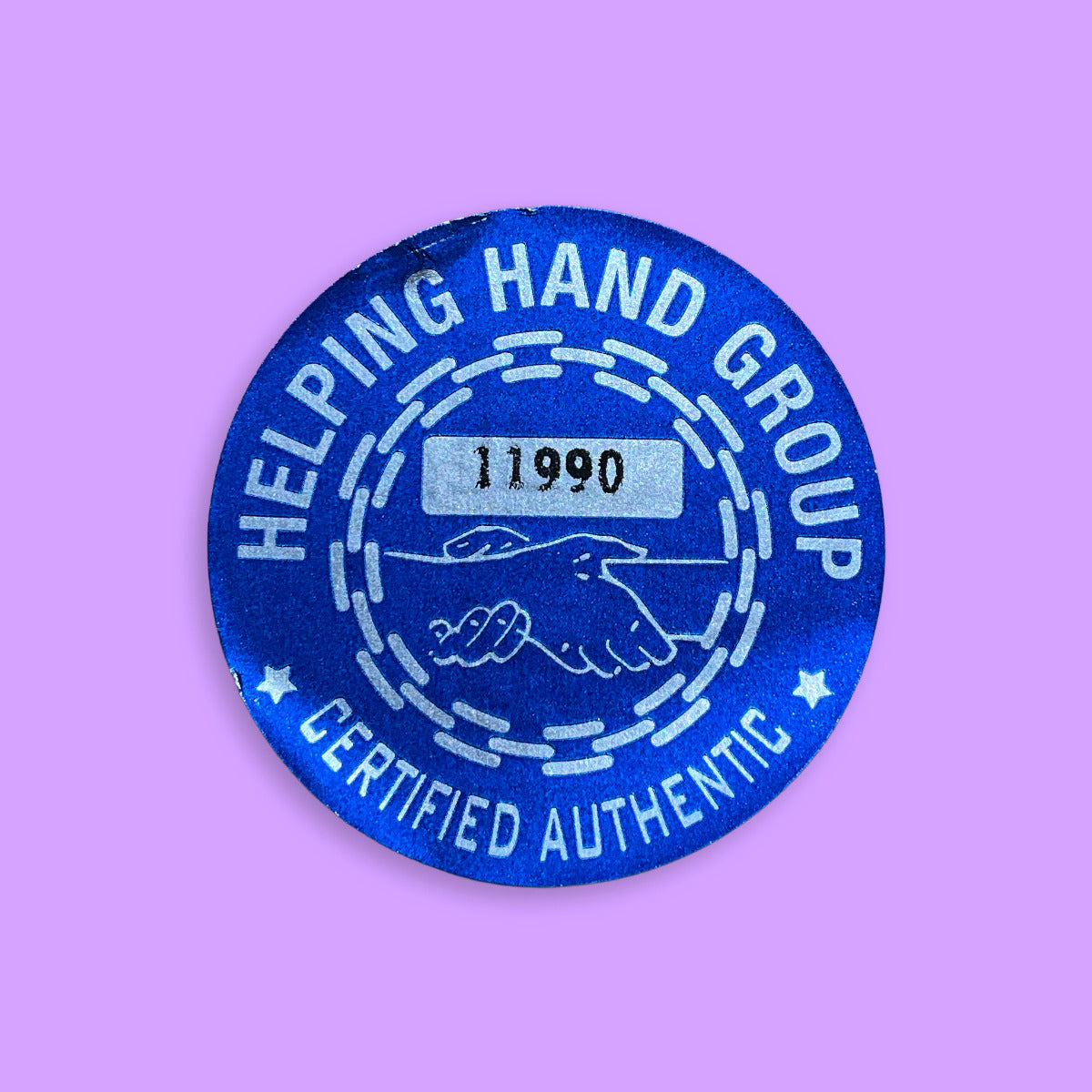 Blue circular badge with 'Helping Hand Group' text and certification number on a purple background
