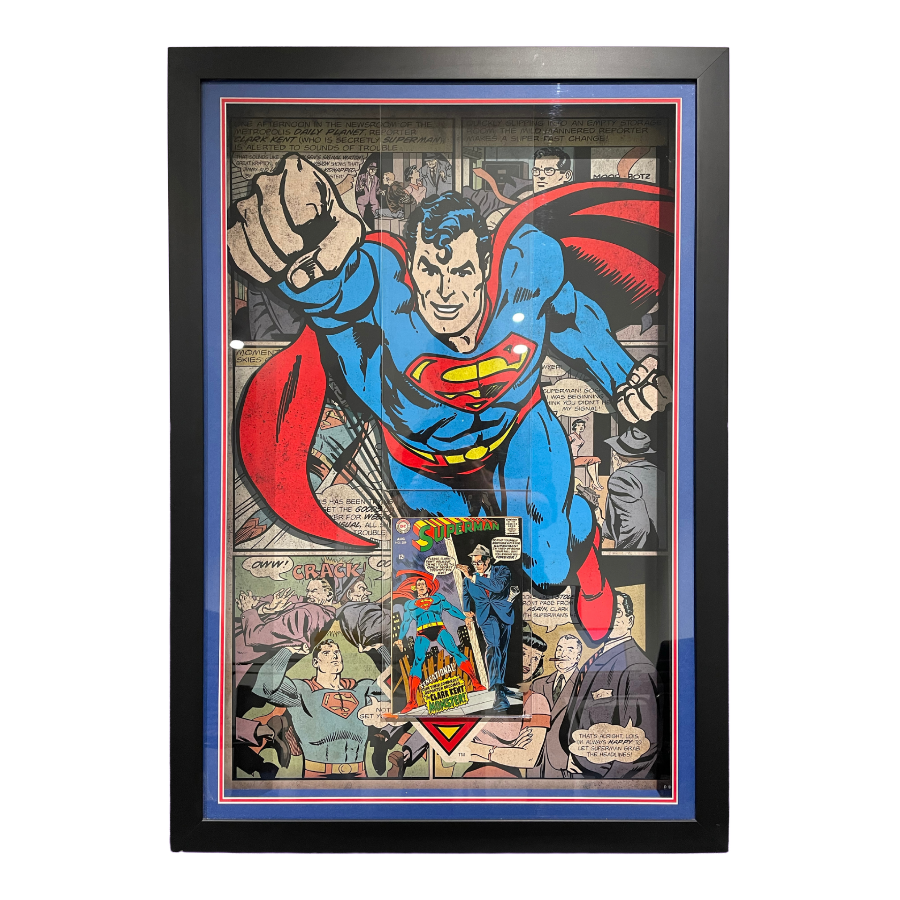 Framed Superman comic book art with superhero in blue and red costume on a white background