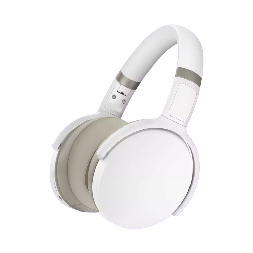 White and beige headphones on a purple background