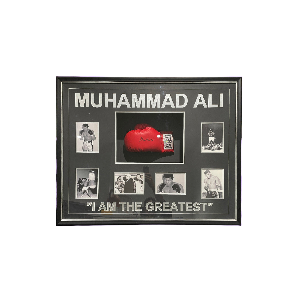 Framed Muhammad Ali memorabilia with a red car and portraits on a purple background